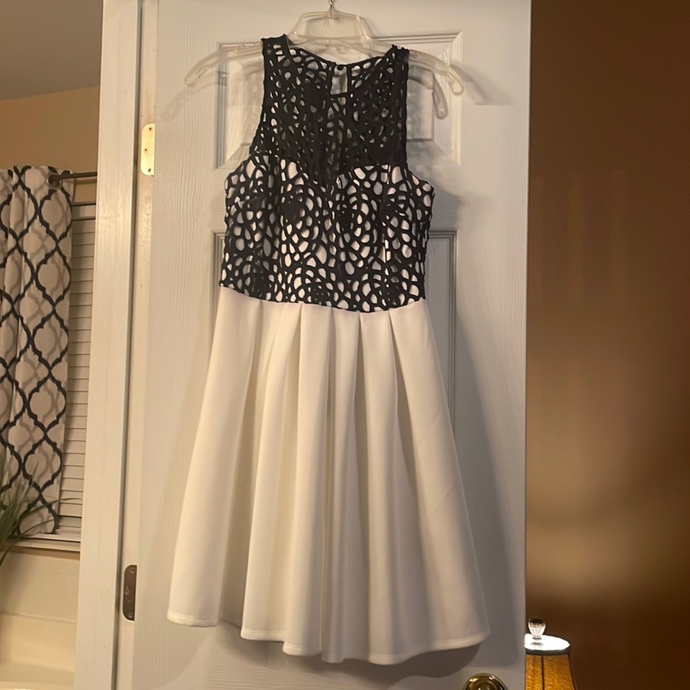 Adorable blue and white cocktail dress.  Worn once.